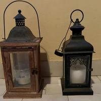 2 lanterne: sn. in legno e metallo, dx. in metallo