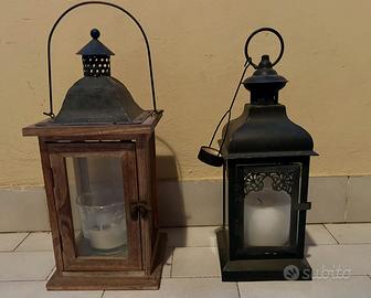 2 lanterne: sn. in legno e metallo, dx. in metallo