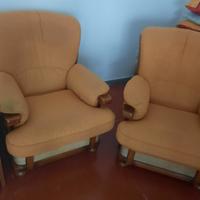 Due poltrone color senape