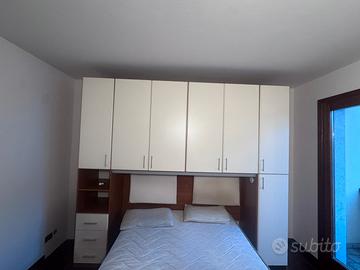 Struttura letto con armadio a ponte
