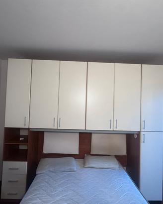Struttura letto con armadio a ponte