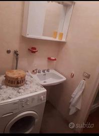 Stanza singola in trilocale con giardino privato