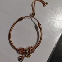 Bracciale pandora oro rosa e charmes