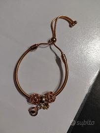 Bracciale pandora oro rosa e charmes