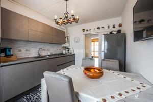 Quadrilocale con balcone, cantina e garage.