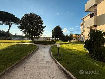 Trilocale con ampio giardino e posto auto