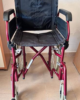 Sedia a Rotelle