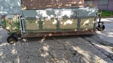 Macchina per caricare avicoli