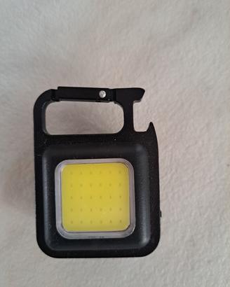 Luce portachiavi cavatappi