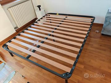 Rete a doghe in legno