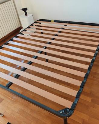 Rete a doghe in legno