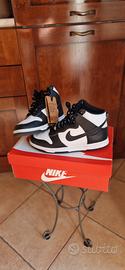 Nike Dunk High Retro "Panda" in pelle bianca e ner
