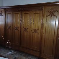 Camera da letto stile classico noce