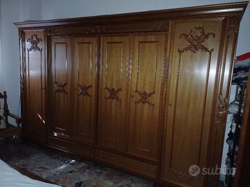 Camera da letto stile classico noce