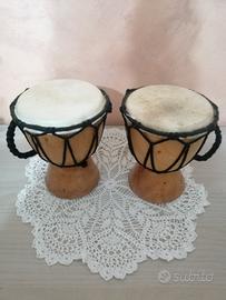 Coppia di bonghetti in legno e pelle