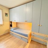 Armadiatura a ponte per camera da letto