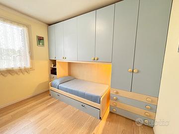 Armadiatura a ponte per camera da letto