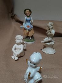 Lotto 4  piccole statuette vintage