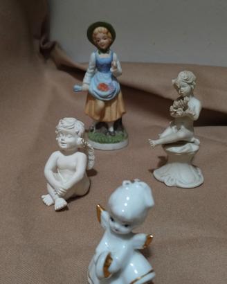 Lotto 4  piccole statuette vintage