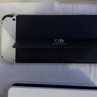 Nintendo Switch oled con super Mario preins