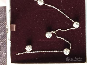 lotto:due collane un portachiavi di g. Raspini 
