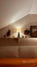 Lampada artigianale su tronco di legno