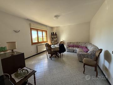 AC925 - Appartamento con garage e giardino