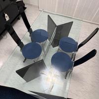 Tavolo in vetro con sedie