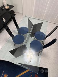 Tavolo in vetro con sedie