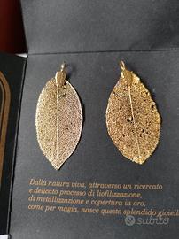 set due ciondoli di foglie vere ricoperte in oro
