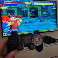 console retro con 2 joystick e tanti giochi sopra 
