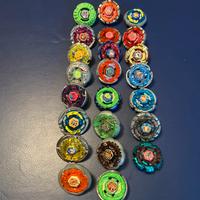 Set da 23 bleyblade+ arena e lanciatori