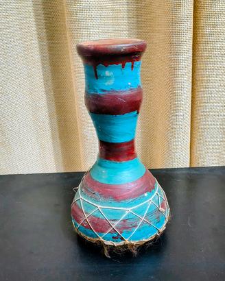 Bongo ,in terracotta con base in pelle naturale 