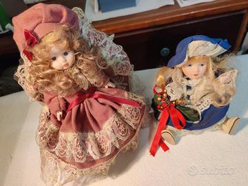 Coppia bamboline decorative in ceramica