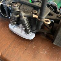 Fermo ammortizzatori posteriori per Xray M18