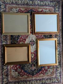 Quattro cornici in legno