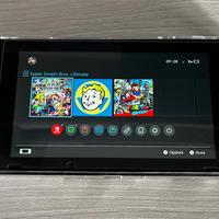 Nintendo Switch + joycon + SD + custodia + giochi