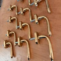 11 Maniglie in ottone nuove, mai usate