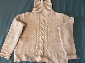 Maglione collo alto beige con trecce