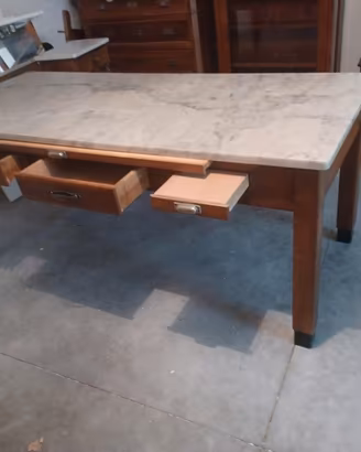tavolo in legno con  piano in marmo e cassetti