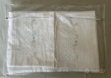 Lenzuola e copri cuscini ricamati a mano