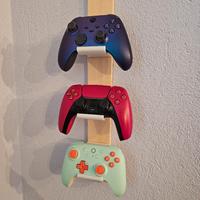 Espositore game pad da muro. Prezzi variabili