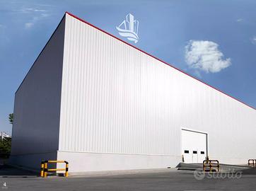 Laives: capannone con terreno e appartamento