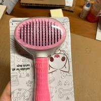 Spazzola per cani e gatti autopulente