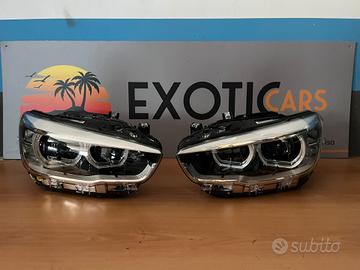 Coppia di fanali ANTERIORI originali BMW ADAPTIVE 