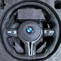 Volante BMW in carbonio