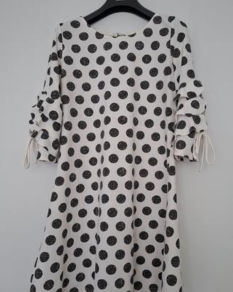 vestito bianco a pois