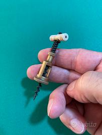 Antico cavatappi miniatura