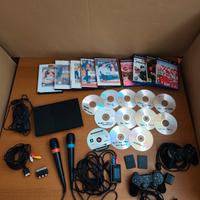 Consolle PS2 slim- giochi - microfoni- controller 