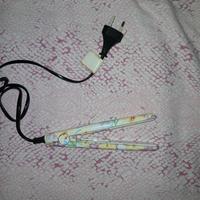 piccola piastra per capelli 